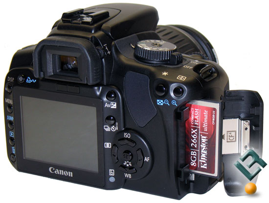 Compact Flash Card being inserted into a DSLR